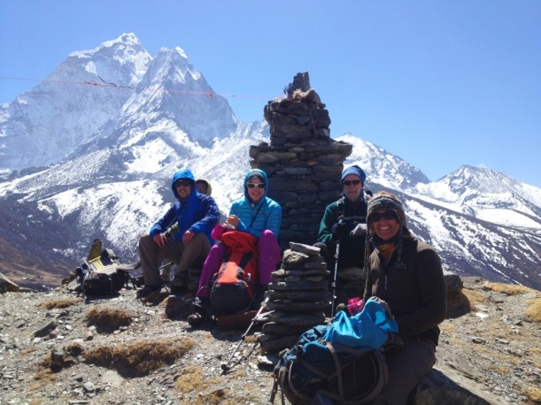 A well-earned rest at the top of La Jung. (Left to right: Mingma Nuru Sherpa (behind), one of our guides Peter, Viki, Martin  and Julie).
